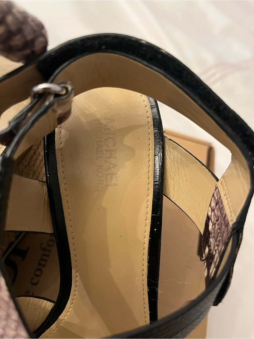 Michael Kors features black